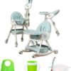 Silla mecedora con babero, vaso entrenador y plato de comida